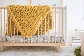 This plush blanket with giant stitches is just the thing to cuddle up with this winter. Yes You Really Can Arm Knit A Blanket In Less Than 1 Hour Hgtv