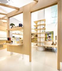 Produce Intersects Two Retail Spaces With Plywood Planes In Singapore Shop Interiors Wood Interiors Retail Space