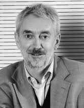 Voltage‐Control of Magnetism in All‐Solid‐State and Solid/Liquid  Magnetoelectric Composites