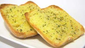 Garlic Bread Is Actually Regular Bread Topped With Minced Garlic And Olive Oil Or Butter Which Is The Homemade Garlic Bread Garlic Bread Easy Make Garlic Bread