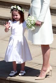The day every mother dreams of finally happened for doria ragland, mother of meghan markle doria wore a beautiful pale green dress and coat ensemble by oscar de la renta. Royal Wedding Princess Charlotte Matches White Flower Crown To Her Bridesmaid Dress Allure
