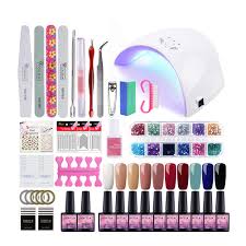 Amazon Com Gel Nail Polish Kit With U V Light Starter Kit 36w Led U V Nail Dryer Lamp 10 Colors Gel Polish Set Base Top Coat Nail Tools Nail Art Decorations Rhinestones