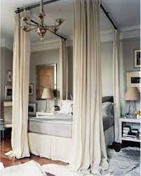 These easily screwed in and kept the rod secure and safe from falling. Clever Idea Four Poster Look With Curtain Rods Home Canopy Bed Diy Modern Bedroom Design