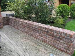 Pin By Sarah Lack On Backyard Garden Wall Brick Garden Small Garden Wall Ideas