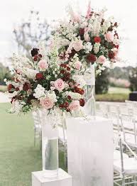 Unique Wedding Ceremony Flower Ideas Love These Tall Clear Vases And Stands That Wedding Ceremony Flowers Blush Wedding Centerpieces Tall Wedding Centerpieces