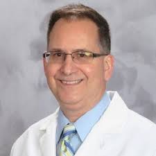 DR. GREGORY P. KEZELE