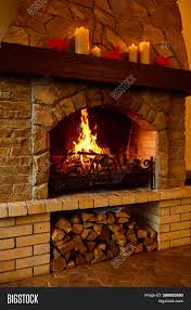 Stuck in the middle of a polar vortex? Warm Cozy Fireplace Image Photo Free Trial Bigstock