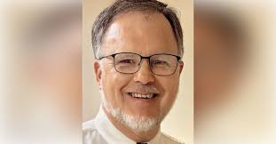 Obituary information for Reverend Barry Moll