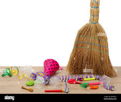 Broom Sweep The Trash After A Party On White Background Close Up Stock Photo Alamy