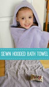 (you can also just fold the towel in half to find the center as well) once the hood is lined up perfectly with the bath towel, pin the edges together. Sew Up An Easy Hooded Bath Towel Make And Takes