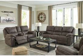 A quick glance at this pairing, and we can easily see the clairemont coffee table is too tall for our sofa. Benchcraft Trementon Faux Suede Reclining Sofa Lindy S Furniture Company Reclining Sofas