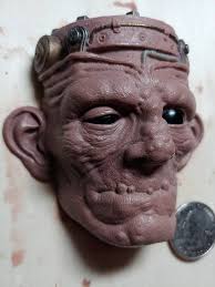 Frankenstein piece i recently finished. Sculpted in monster clay hard
