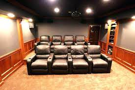 Home theater basement pictures home theaters and media roomsthis room was transformed from a less than perfect basement storage room to a striking home theater complete with warm wood detail. Home Theater Room Design Novocom Top