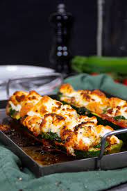 Keto Zucchini Pizza Boats With Goat Cheese Diet Doctor Recipe Goat Cheese Recipes Diet Doctor Recipes Vegetarian Keto