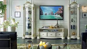Featuring two open shelves, and one large concealed compartment perfect for stashing dvds, board games, electronics, and media accessories, this entertainment center is the ultimate gathering place and will create a statement in any space. Tv Stand Contemporary Classic Style Idfdesign
