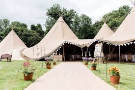 15 Of The Best Festival Wedding Venues For The Coolest Couples Festival Wedding Tepee Wedding Tipi Wedding