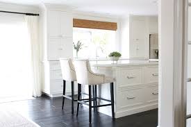 Those white melamine cabinets from the. White Kitchen With Dark Wood Floors Would We Do It Again