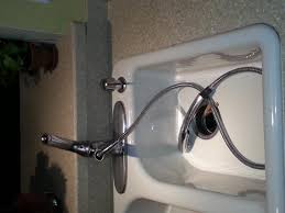 Leaking from around the handle. Replace Delta Faucet Sprayer Hose Hole In Sink To Tight To Remove Install Doityourself Com Community Forums