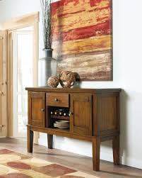 The table may be the center of your dining room, but these storage pieces have an invaluable part to play. Ralene Medium Brown Dining Room Server Nc Gallery Furniture