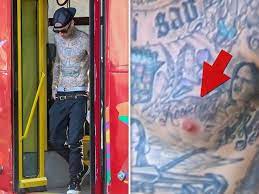 See the reality star tattoo i love you onto the rocker's arm here. Travis Barker Gets Kourtney Kardashian S Name Tattooed On His Chest