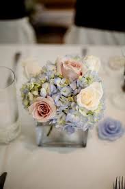 Small Wedding Centerpieces Blue Hydrangea And Pale Pink Roses Small Wedding Centerpieces Pink Wedding Centerpieces Flower Centerpieces Wedding