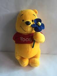 Winnie the pooh was originally created by english author a.a. Winnie The Pooh Holding Flower Stuff Toy Hobbies Toys Toys Games On Carousell
