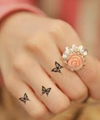 Incredibly Hot Little Butterfly Tattoos On Finger For Women Finger Tattoos Tiny Butterfly Tattoo Tiny Tattoos