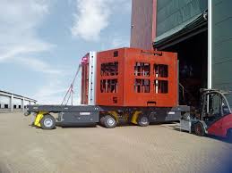Built in standardized dimensions and indefinately compatible these modules are able to move weights way over 10.000 tons, all at the tip of a joystick. Scheuerle To Launch Spmt Powerhoss In U S At The Conexpo Con Agg Heavy Lift News