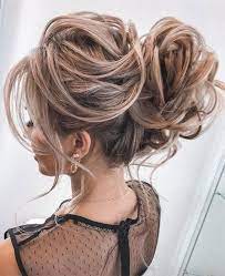Grab a section of hair in the front of the head and tie a knot. Gorgeous Updos For Medium Hair To Inspire New Looks