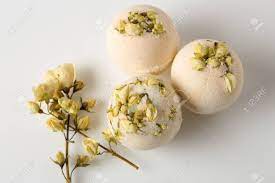 Shower fizzies versus bath bombs. Bath Bombs Decorated With Dried Linden Flowers On A White Background Stock Photo Picture And Royalty Free Image Image 78240878