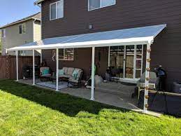 Palram Feria 10 Ft X 28 Ft White Patio Cover Awning 702727 The Home Depot Covered Patio Patio Small Covered Patio