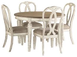 Featured in 2020 spring lookbook. Realyn Dining Table And 4 Chairs D743 35 02 4 Dining Room Groups Price Busters Furniture