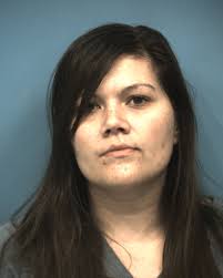 Police: Woman arrested had ID information of 57 different people