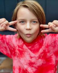 It's National Son's Day… and I got a one of those too. Holt Fisher Smith  Age 9 Loves his family & friends, kills it