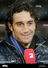 Luca Toni striker of Bayern Munich gives an interview after the UEFA Cup  round of 16's 2nd leg FC Bayern Munich v RSC Anderlecht at Allianz Arena  stadium of Munich, Germany, 12