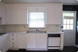 The safest bet for white paint to use on kitchen cabinets is undoubtedly simply white by benjamin moore because it's the perfect white in my opinion and no client has ever regretted the choice or said it was too white or too off white. Painting Oak Cabinets White An Amazing Transformation Lovely Etc