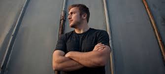 Former Saluki football player Logan Mize stays true to his country roots