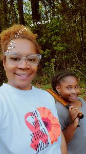 Proud mom awaits daughter's graduation ceremony