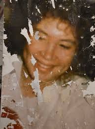 Please can somebody restore this photo of my late mother, it's the only one  I have of her. Thanks