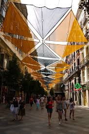 Orange And Black Canopy Over The Shopping Street Calle Del Arenal Madrid Spain 7 Canopy Design Canopy Outdoor Canopy Architecture