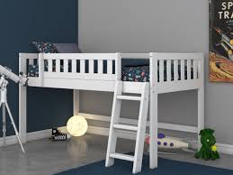It has straight square posts, rectangular crossbars, vertically slatted both a headboard and a footboard, horizontal guardrails, a slat rool foundation. Discovery World Furniture Twin Low Loft Bed In White