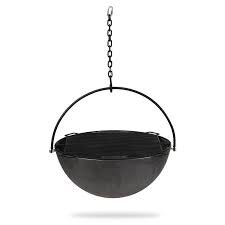 I picked it up at a yard sale and sometimes used it as a fire pit for burning wood. Titan Great Outdoors Couldron Fire Pit Bowl With Grate And Chain 42 Cast Iron Walmart Com Walmart Com