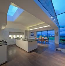 Open plan living at the rear of the house leading out to the undercover outdoor kitchen area. 6 Most Amazing Skylight Ideas To Make Your Kitchen Look Spectacular My Decorative