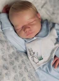 Reborn doll with soft blonde hair created