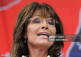 Former Alaska governor Sarah Palin greets Ken Crow of the Tea Party... News  Photo