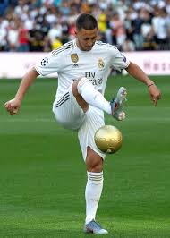 Eden hazard real madrid soccer player. Eden Hazard Wears Real Madrid Shirt For First Time At Bernabeu Unveiling Then Kisses Badge Football Sport Express Co Uk