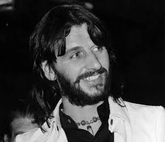 It Don't Come Easy" by Ringo Starr or "Give Me Love" by George Harrison?