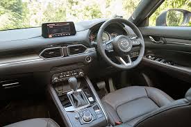 Genuine layered wood trim, caturra brown nappa leather seats and ambient cabin lighting, to name just a few, combine to indulge the senses of both driver and. Mazda Cx 5 2 5 Becomes Even More Compelling Following Update Torque