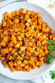 Roasted Sweet Potato Cubes Perfeclty Crisp Every Time Evolving Table Recipe Sweet Potato Recipes Healthy Roasted Sweet Potato Cubes Stuffed Sweet Potato Healthy