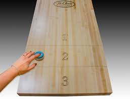 It can be played with either 2 players or 4 players. The Differences Between Table Shuffleboard Ground Shuffleboard